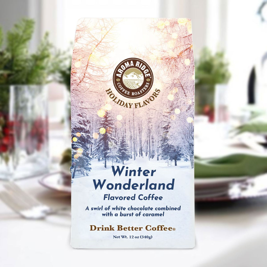 Aroma Ridge coffee package labeled 'Winter Wonderland' on a blurred holiday table setting.